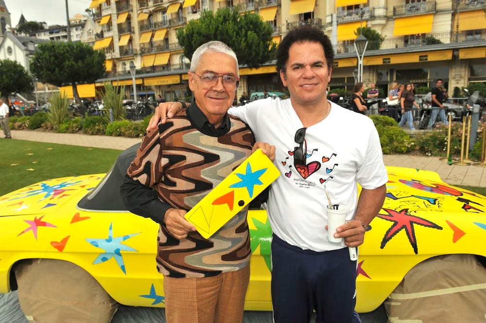 Claude Nobs et Romero Britto devant l’Alfa Romeo, dans les jardins du Montreux Palace.