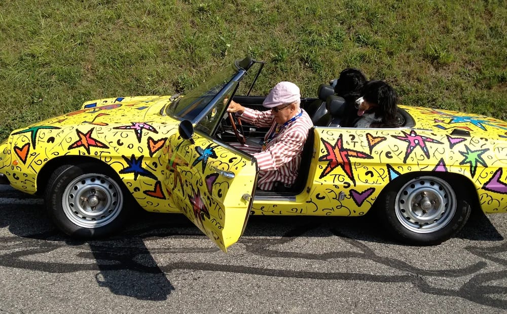 Claude Nobs au volant, avec ses bouviers bernois.